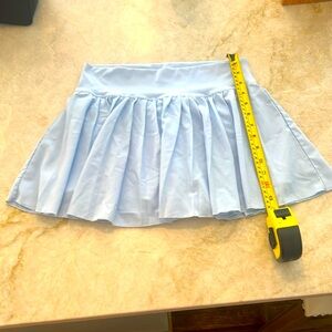 Blue Altar’d State tennis skirt size women’s large. Like new never worn.
